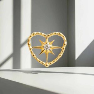 Piercing Corazón con estrella de titanio grado implante recubierto en oro pvd