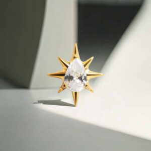 Piercing Estrella con lágrima de titanio grado implante recubierto en oro pvd