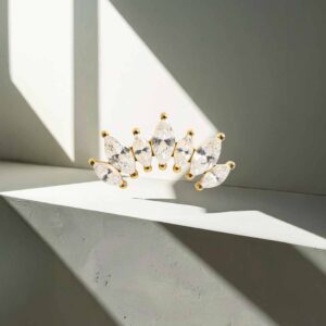Piercing Marquise 7 puntas de titanio grado implante recubierto en oro pvd